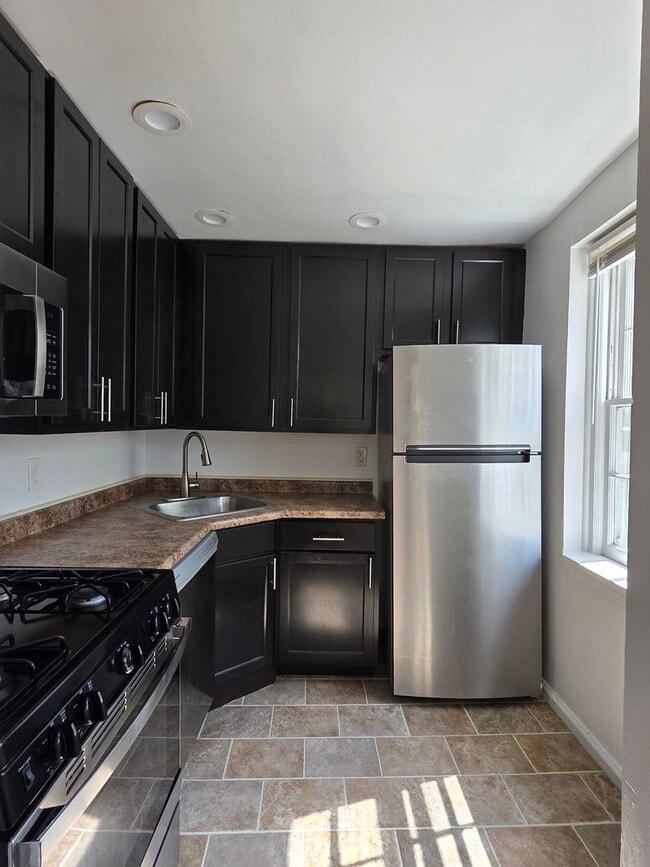 Building Photo - 2920 Woodpipe Ln Unit D Rental