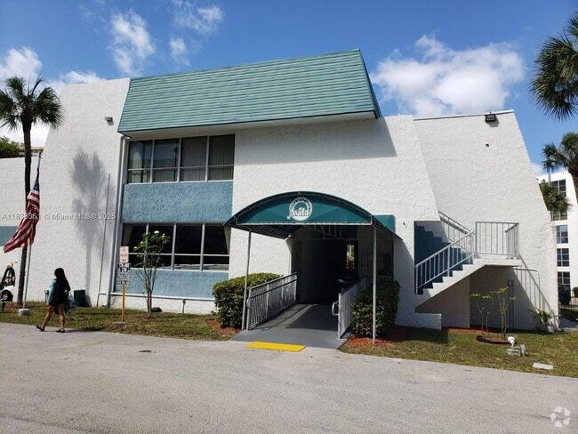 Building Photo - 200 177th Dr Unit 402 Rental