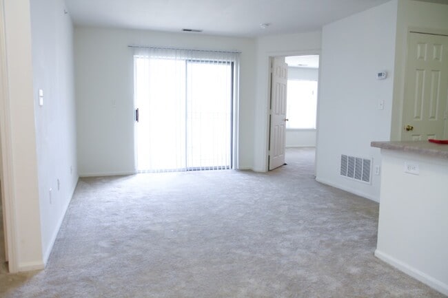 Bright and open living space with patio access