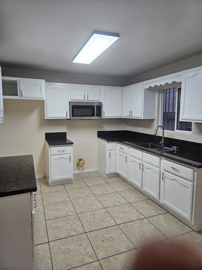 Building Photo - 8940 Orchard Ave Unit Back Rental
