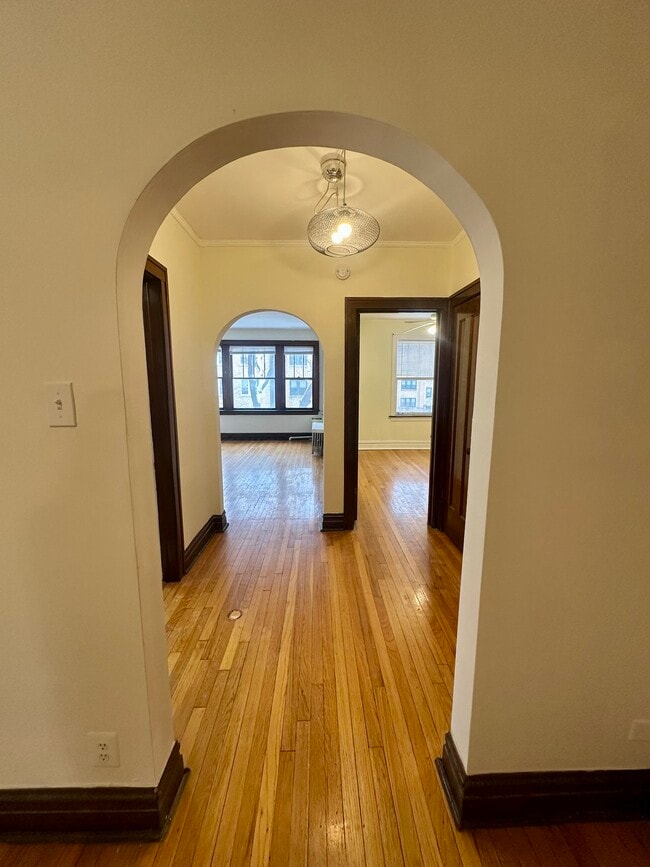 looking into foyer from dining room - 4036 N Mozart St Unit 2