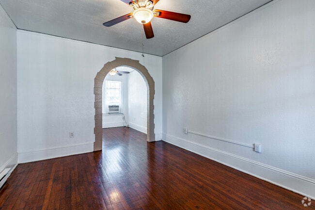 2BR, 1BA - 750SF - Living Room and Dining Room - Spanish Oaks Apartments