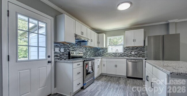 Photo - 910 E 6th Ave