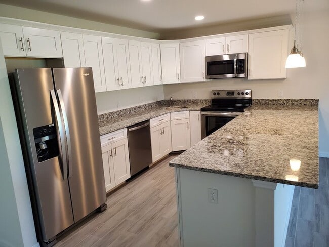 Photo - Coming Soon Newer 3x2 Duplex Unit Unit 4740 13TH ST SW