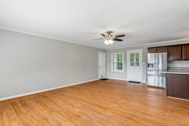 Photo - Updated Home, Stainless Steel Appliances, Wood Like Flooring, Deck, Garage!