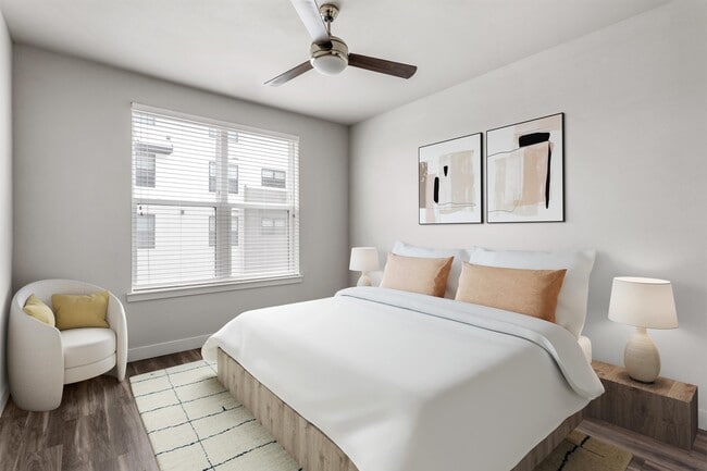 There is floor space left over for a chair once the bed is in place.