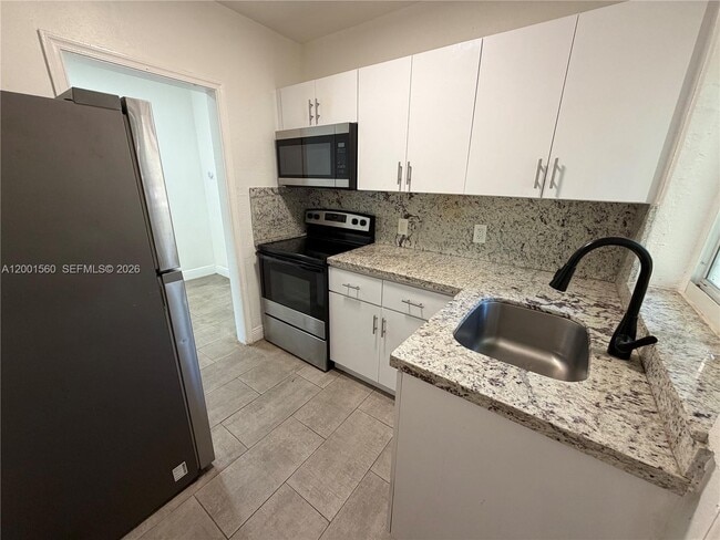 7712 NE 1st Ct Unit -