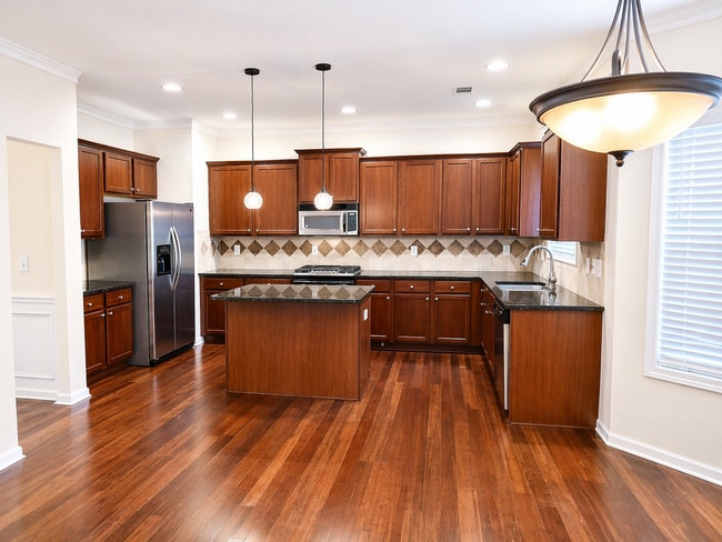 Updated kitchen with brand-new stove and modern cooking space. - 2143 Somerset Pl SE