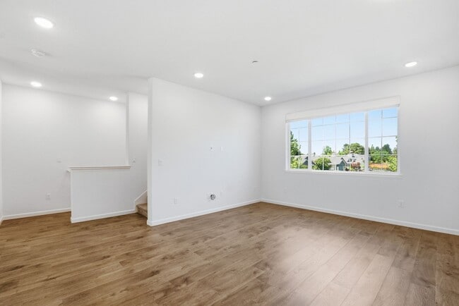 Photo - Spacious 3 Bed Townhome with Garage, A/C & Modern Finishes