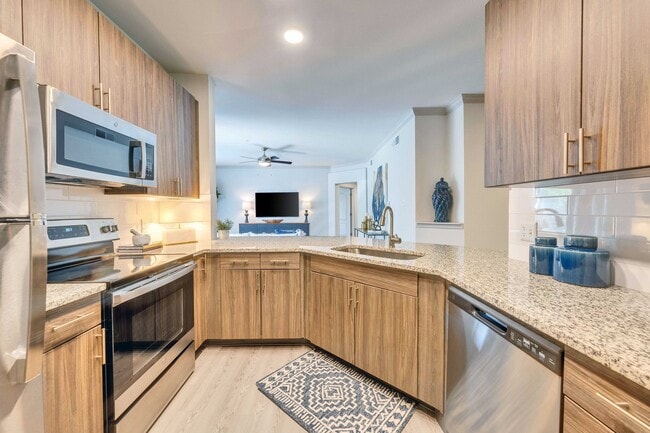 Beautifully remodeled kitchens feature stainless steel appliances - Ridgeview