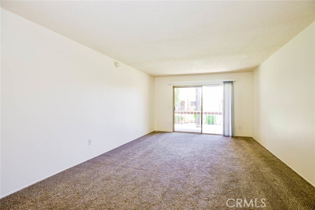 Photo - 6600 Warner Ave Unit 56