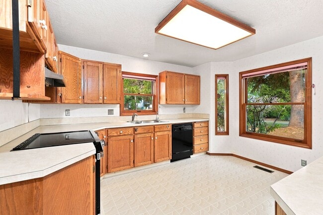 Photo - Charming 3-Bedroom Home with Garage & Lawn Care Included