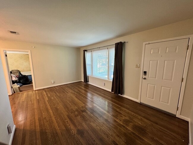 Photo - Stylishly Renovated Home with Fenced Backyard & Two Living Areas!
