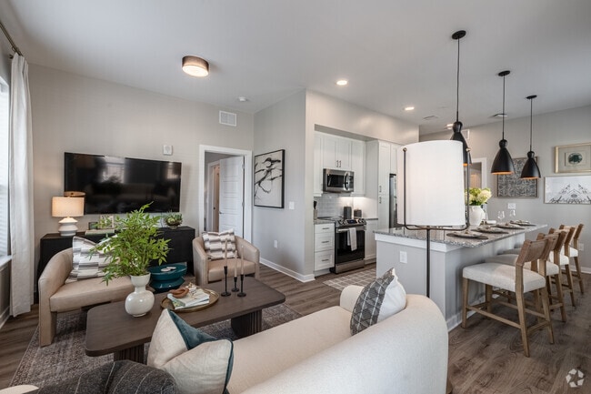 B4 - 2BR, 2BA - 1179SF - Living Room - Pilot & Park