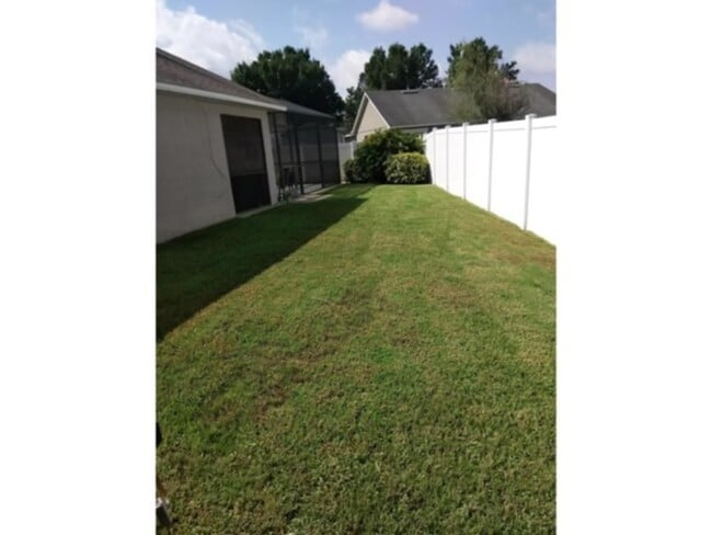 Photo - "Charming 3-Bed Pool Home with 2 Full Baths in St. Cloud – 1,642 Sq. Ft. of Comfort Awaits!" Pool...