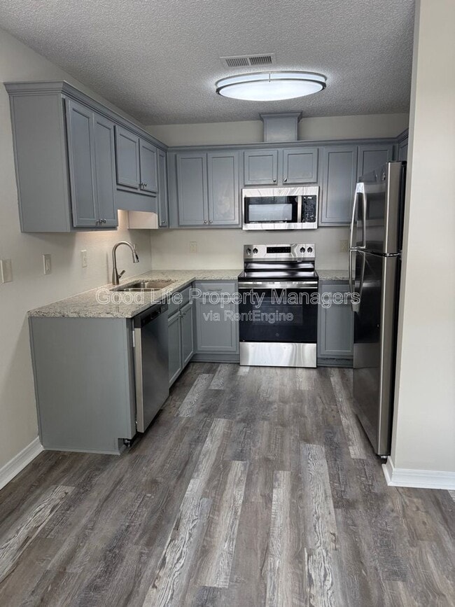 Building Photo - 9980 Bowman Ave Unit C