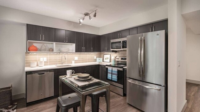 South Building apartments equipped with quartz countertops, onyx-finish cabinets and modern lighting