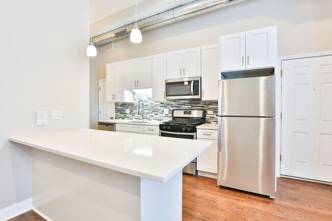 Photo - Gorgeous 2Bed/1bath in Logan Square! Condo Quality! In-Unit Laundry! Central Air! Stainless Steel! Unit 1F