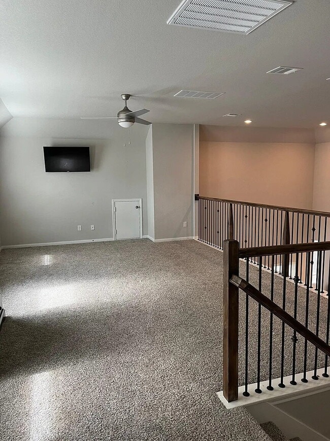 Photo - Four bedroom home with dedicated home office, game room, 2.5 bathrooms, and fenced yard in Fairwa...