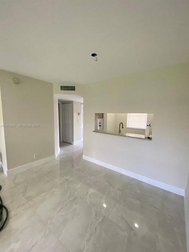 Photo - 8830 Royal Palm Blvd Unit 202