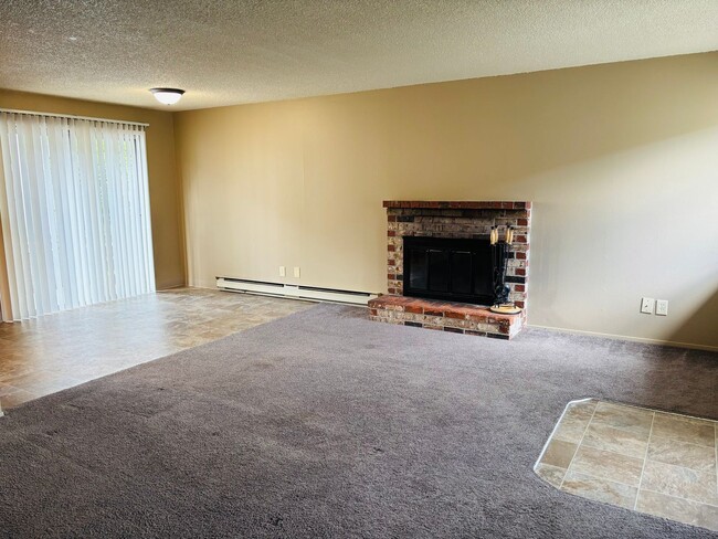 Photo - Bright 2 BR Carter Park Living with Fireplace, Carport, and Tons of Storage!