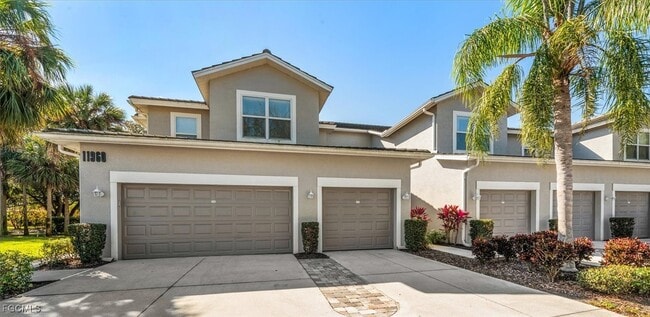 Building Photo - 11960 Champions Green Way Unit 201