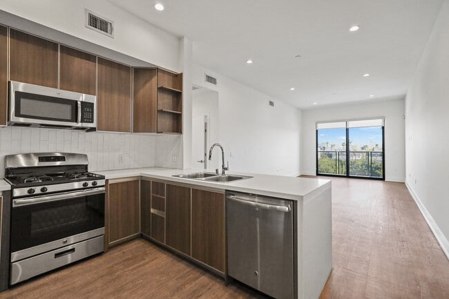 Open-Concept Kitchen, Dining, and Living Room Areas