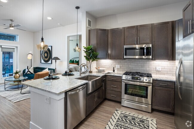Building Photo - Downtown Vibes + 8 Weeks Free – Tour Today! Unit AJH2 Rental