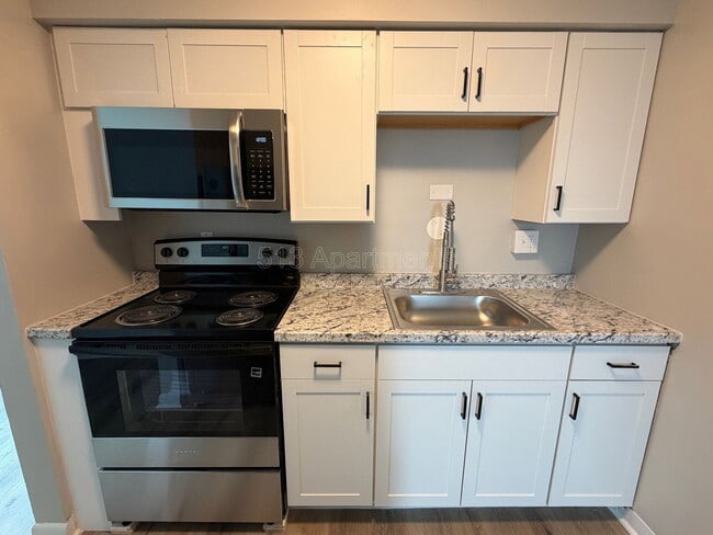 Building Photo - 5146 Carthage Ave Unit 9