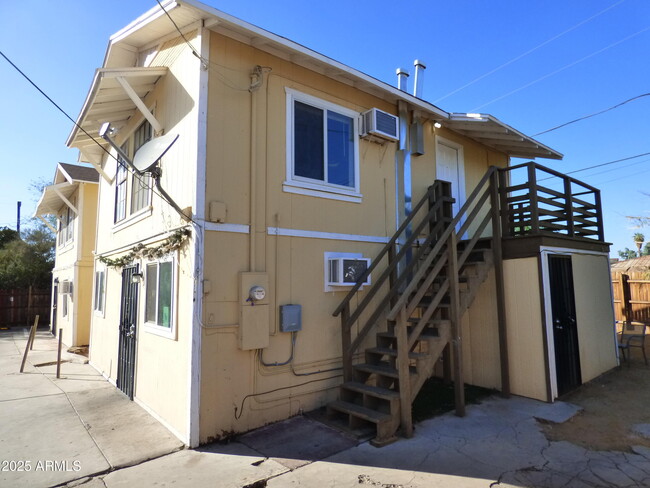 Building Photo - 1836 E Harvard St Unit B