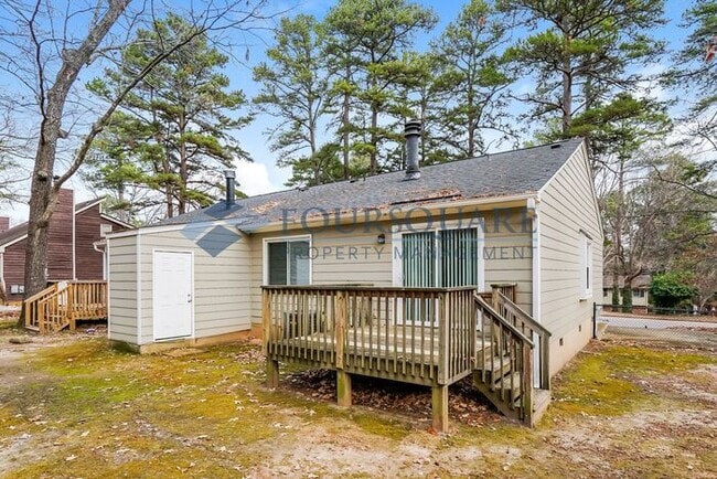 Photo - Charming 2-Bed / 2-Bath Duplex with Open Floor Plan & Shared Fenced Yard , Near I-40