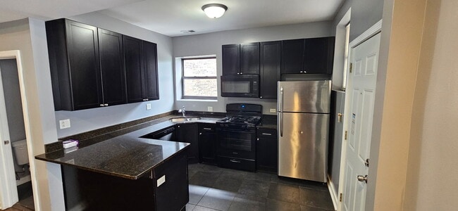 Building Photo - 6846 S Cornell Ave Unit 2S