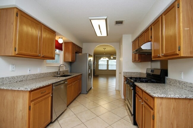 Photo - Great 1 story home on a pretty lot with lots of trees!