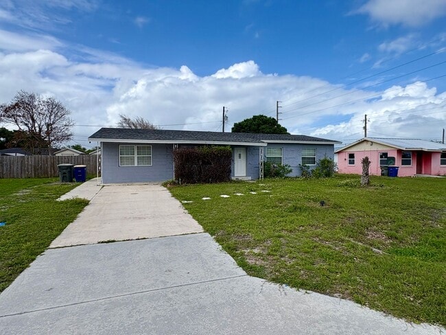Building Photo - Spacious 3/2 on large lot in Paradise Park (Ft. Pierce) W/ LAWN CARE INCLUDED