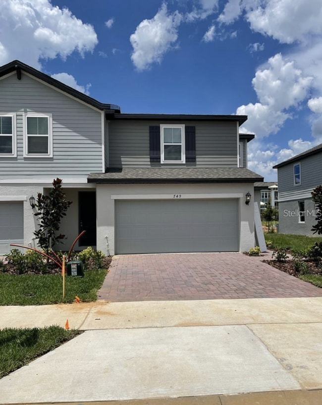 Photo - Beautiful corner unit townhouse features an abundance of natural
light.