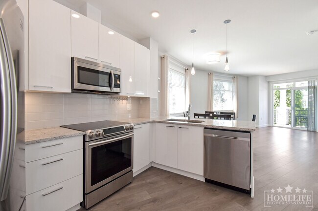 Photo - Corner Gem with Private Greenbelt Views – ... Unit 407