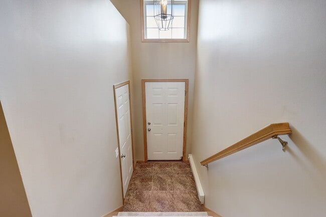 Front door ahead. Garage on the left - 1222 Bergmann Dr