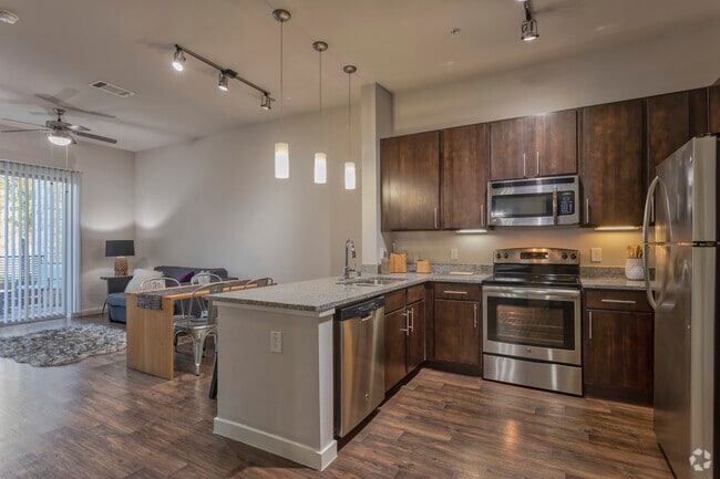 1BR, 1BA - 733 SF A5 - Kitchen - The District at Cypress Waters - Scotch Creek