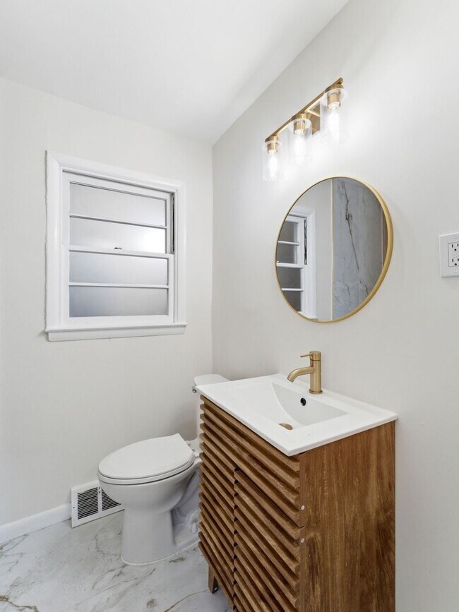 Photo - Charming Renovated 4-Bedroom Rental with Spacious Backyard & Bonus Basement Space in Somerdale