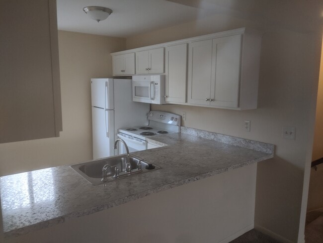 Building Photo - 4051 Oneida St Unit 8