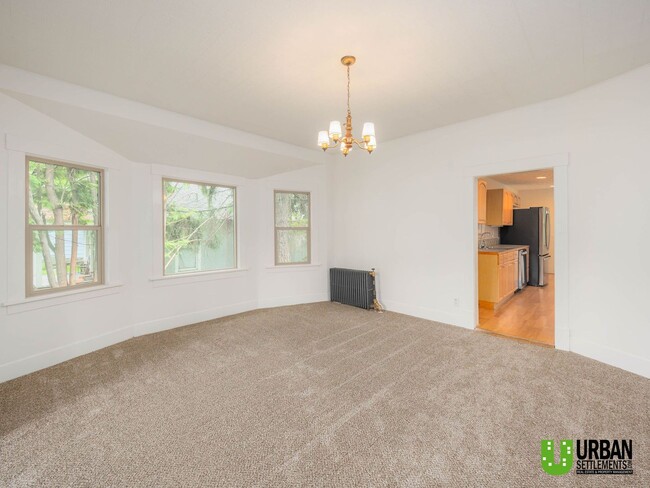 Photo - Spacious 4-Bedroom Home with 2-Car Garage, Basement Storage & Flexible Living Space in North Spokane