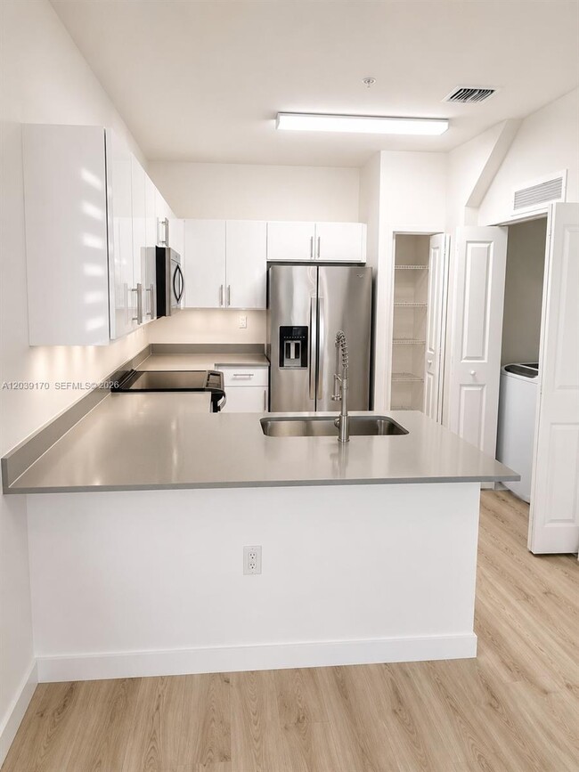 Photo - 15560 SW 136th St Unit 201