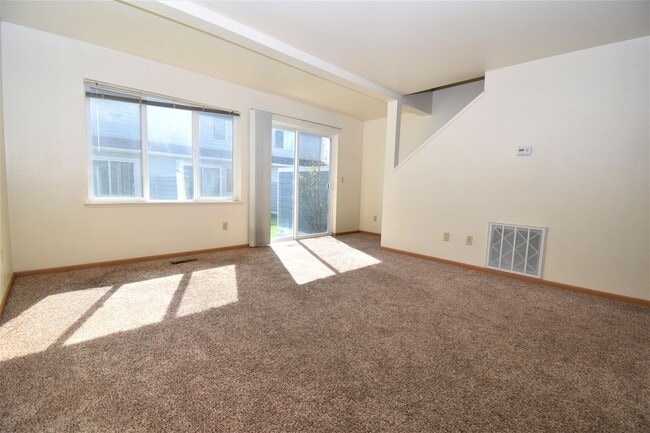 Photo - Townhouse style 2 bedroom 1.5 Bath with Attached Garage! Great Location! Unit C