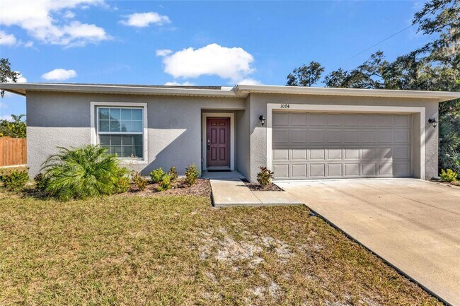 Photo - 3/2 FL dream home w/ large backyard & stylish new construction feel!!