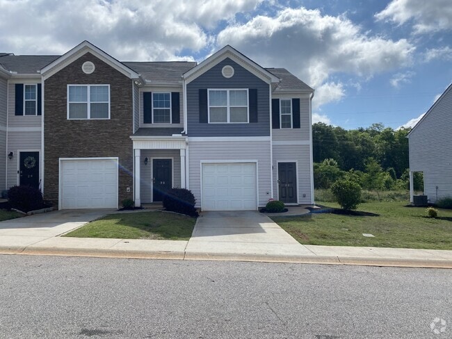 Building Photo - "Modern 3-Bedroom Multiplex with 3 Full Ba... Rental