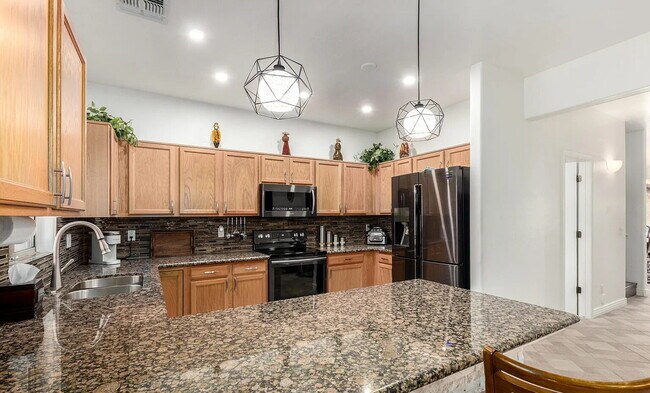 Stunning 4-Bedroom Townhome in Gated Community with Pool & Private Backyard!