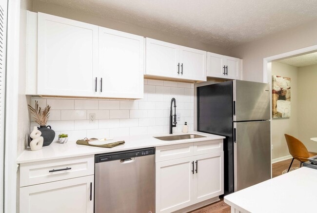 Newly Renovated Kitchen with Quartz Countertops - Rosemont at East Cobb Apartments