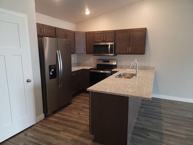 Photo - 3 bedroom 2 bathroom townhome with 1 car garage