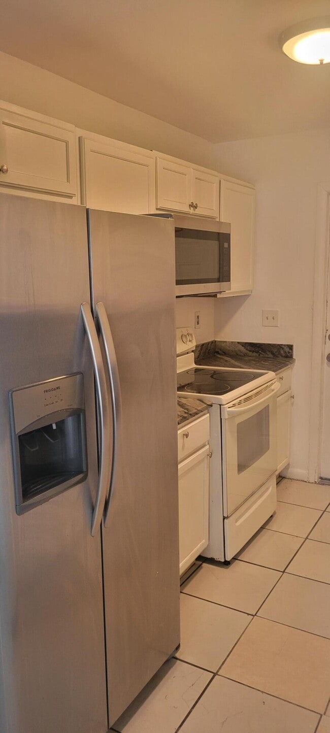 Photo - 1165 W 28th St Unit 4