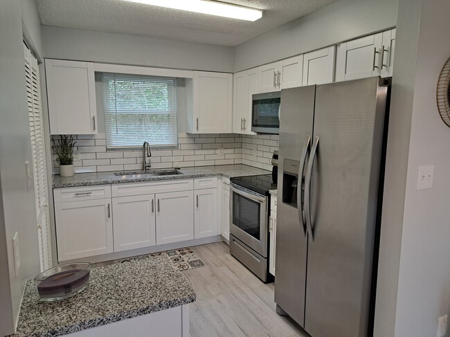 Kitchen View 1 - 6402 Cooper Ln Apartments Unit 4